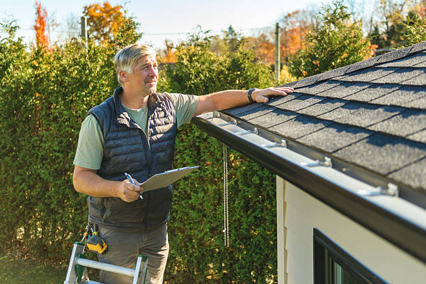 Professional Roofing technician working in Fall River, WI